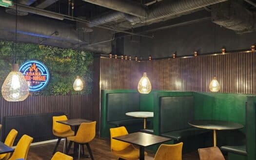 Modern grillrestaurang med toppläge i attraktiv norrförort